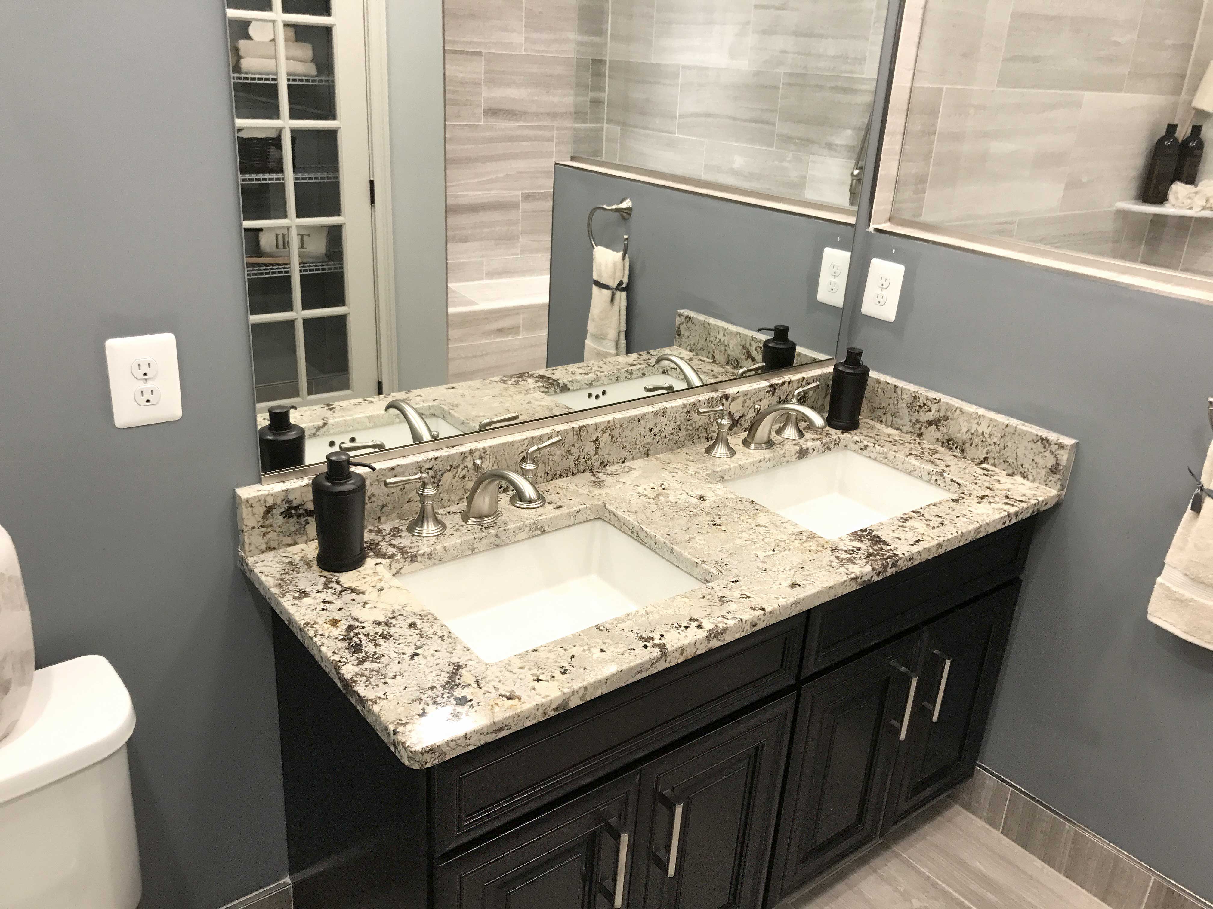 Alaska White Bathroom Vanities - Granite Countertops | Quartz Countertops. Best quality kitchen and bathroom countertops. SKY Marble and Granite Located in Sterling Virginia VA.