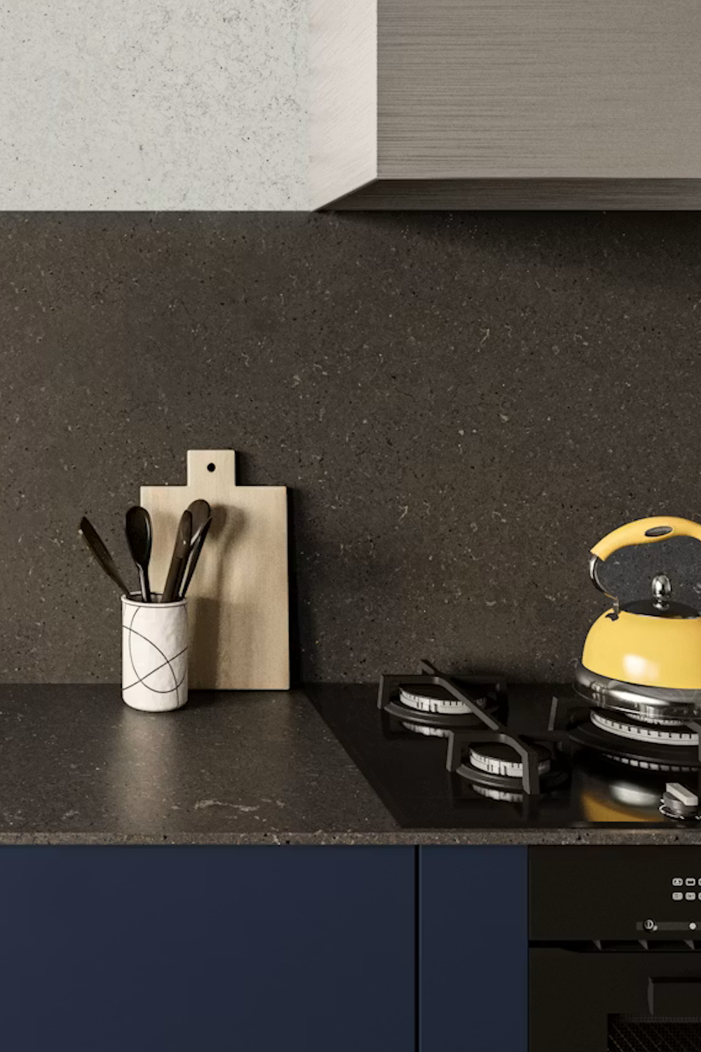 Brass Relish Silestone dark quartz countertop and backsplash with fine mineral speckle above navy cabinetry