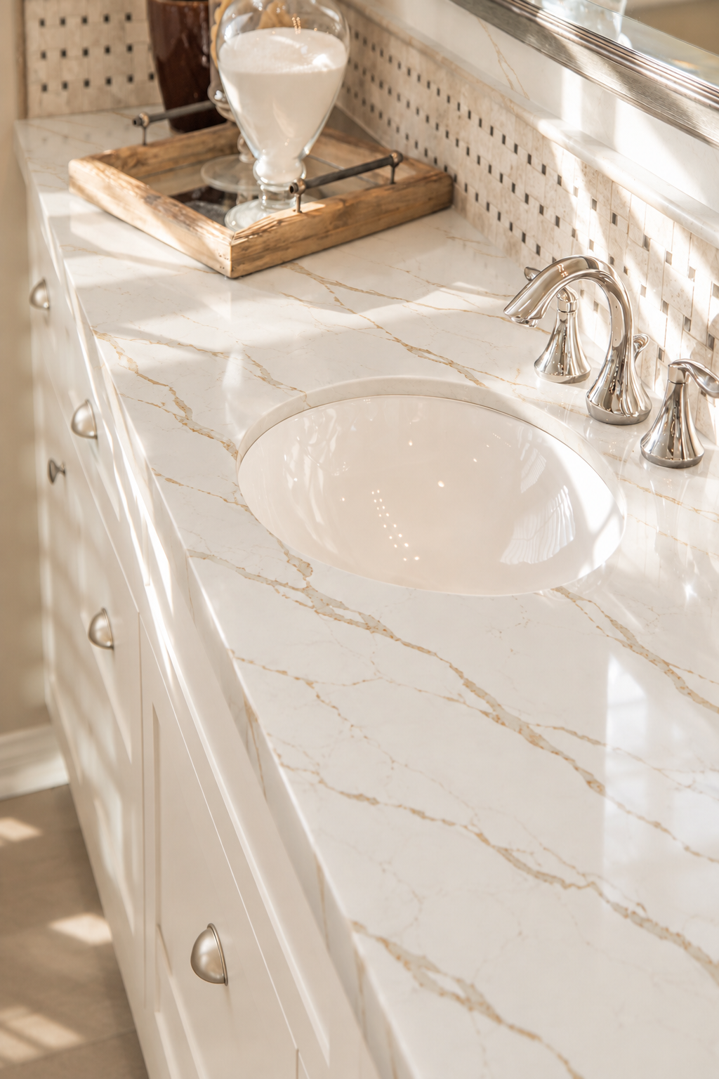 Sunlit Calacatta Laza Oro Countertop Bathroom with brass trims